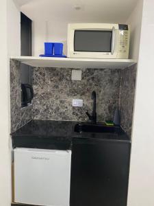 Kuchyň nebo kuchyňský kout v ubytování Apart Dos Naciones