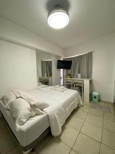 Postel nebo postele na pokoji v ubytování Apart Dos Naciones