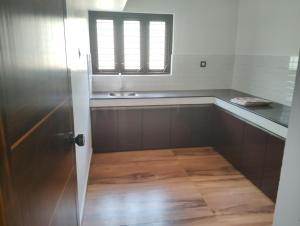 Kuchyň nebo kuchyňský kout v ubytování Blue Horizon Homestay + 20 fotografií