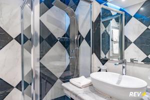 Et badeværelse på Via Veneto Suites