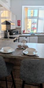 Køkken eller tekøkken på Longrow Apartment