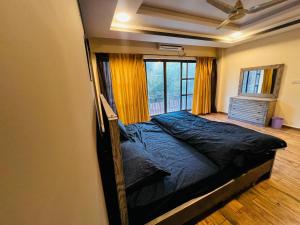 Postel nebo postele na pokoji v ubytování She's living apartment in Islamabad