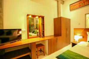 TV a/nebo společenská místnost v ubytování Villa Sanni 18