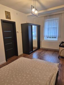 En eller flere senge i et værelse på Połczyn-Zdrój 50m2