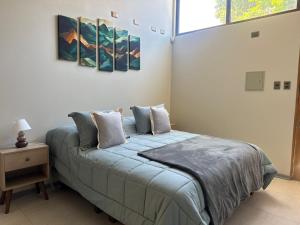 Postel nebo postele na pokoji v ubytování Microdepartamentos Chillán