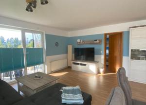 Et tv og/eller underholdning på Ferienwohnung Wiesenblick