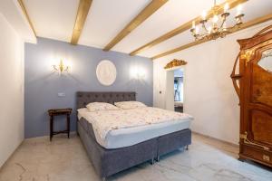 En eller flere senge i et værelse på Haus Saxonia