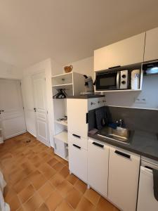 Køkken eller tekøkken på Cabanon Provençal - Le Clos Madame