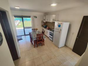 Køkken eller tekøkken på Cabañas De Lourdes