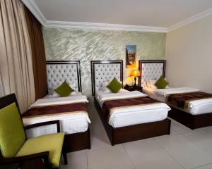 Postel nebo postele na pokoji v ubytování P Quattro Relax Hotel + 64 fotografií