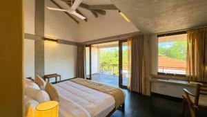 Postel nebo postele na pokoji v ubytování Sanctuary Amaidiyana - A CGH Earth Experience