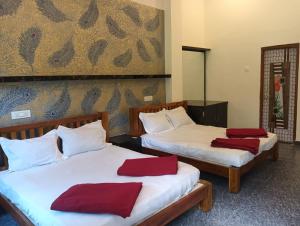 Postel nebo postele na pokoji v ubytování Adventure Inn Dandeli + 28 fotografií