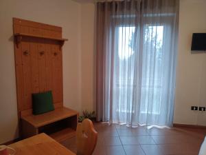 TV a/nebo společenská místnost v ubytování A' Porta i Frustere