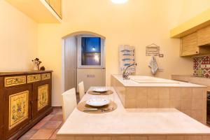 Фотография из галереи Casa Bacardi в Таранто +22 фотографии