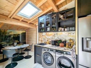 Kuchyň nebo kuchyňský kout v ubytování La Datcha