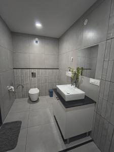 Et badeværelse på Iggu Holiday Home