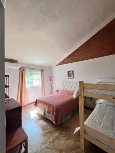 En eller flere senge i et værelse på Residencia 176