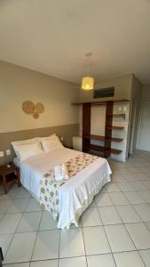 Postel nebo postele na pokoji v ubytování Hotel Mamoan