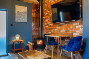 TV/trung tâm giải trí tại The Hideaway +10 ảnh