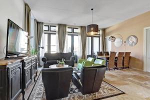 TV a/nebo společenská místnost v ubytování Residence Wijngaerde - Baddomburg