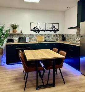 Køkken eller tekøkken på Appartement T2 avec SAUNA privatif