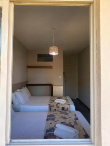 Postel nebo postele na pokoji v ubytování Hotel Mamoan