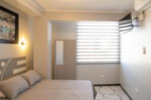 Postel nebo postele na pokoji v ubytování Hostal 3 Lunas