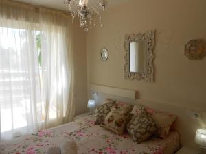 Ένα ή περισσότερα κρεβάτια σε δωμάτιο στο Playa Sol II Apartment