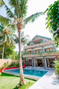 Πισίνα στο ή κοντά στο Sithagi River Front Villa Weligama