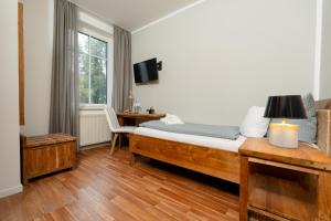 Postel nebo postele na pokoji v ubytování ARTHOTEL Herrsching + 59 fotografií