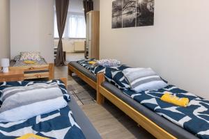 Postel nebo postele na pokoji v ubytování Ubytováni u PÁji