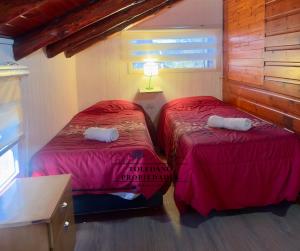 En eller flere senge i et værelse på Aire de Montaña