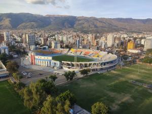 an aerial view of a soccer stadium in a city at Holy Home in Cochabamba