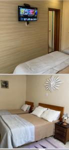 a bedroom with a bed and a tv on the wall at Casas e suites Temporada Tiradentes in Tiradentes +78 photos