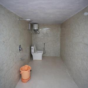 a bathroom with a toilet and a sink in a room at Desert Galaxy Camp - A Family Luxury Camp in Jaisalmer +40 photos