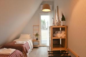 Postel nebo postele na pokoji v ubytování Hygge Beskid + 15 fotografií