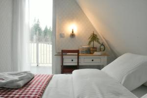 Postel nebo postele na pokoji v ubytování Hygge Beskid