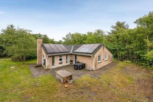an aerial view of a house with solar panels on it at 20832-Tim-Alrum-1 in Alrum