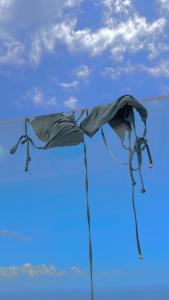 een vlieger vliegt in de blauwe lucht bij MEDITERRANEAN SEASONS, VILLA MEDITERRANEA Taormina, Private Pool & Sea View in Taormina