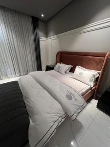 Postel nebo postele na pokoji v ubytování The Lake View Farm