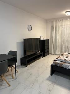 En eller flere senge i et værelse på RiverStone city center