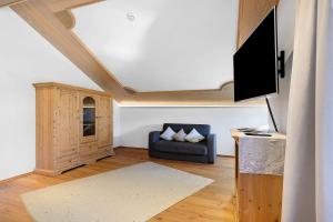 TV a/nebo společenská místnost v ubytování Ferienwohnung Westernberg