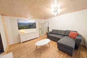 Posezení v ubytování HW13-Urlaubsmagie - für bis zu 10P - Gemeinschaftsgarten mit Sauna & Pool