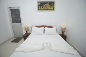 En eller flere senge i et værelse på Birdsong Leisure Resort + 47 billeder