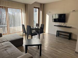 Et tv og/eller underholdning på PARENSOV- Luxury Apartment- RED SQUARE