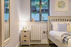 En eller flere senge i et værelse på 2 Bed in Fowey oc-p00715