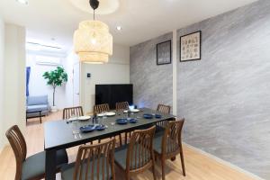 TV a/nebo společenská místnost v ubytování 2025年12月オープンセール 大阪駅まで一駅 フルリノベーション 長期割引有り 最大8人