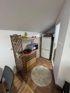 Kuchyň nebo kuchyňský kout v ubytování Studio lux Strpce