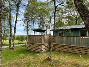 En have udenfor Heather Lodge 1 with Hot Tub