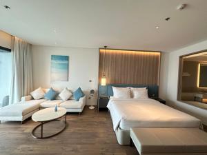 Postel nebo postele na pokoji v ubytování À La Carte Hạ Long Teri Apartment